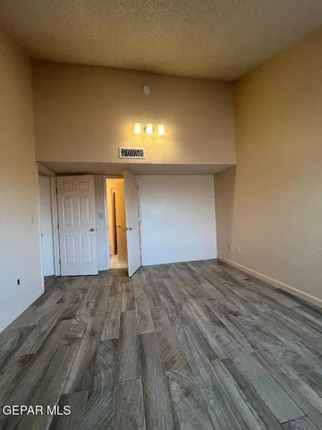 a view of an empty room and window