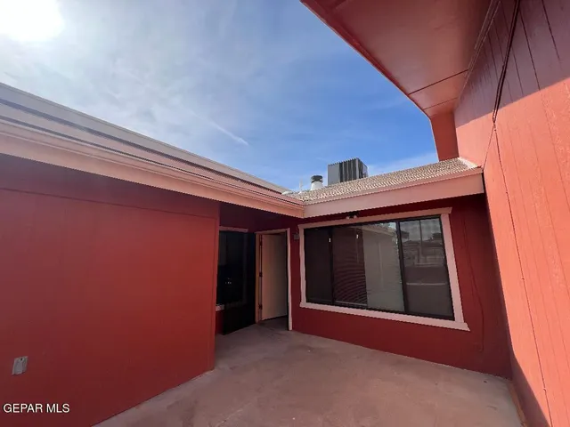 a view of outdoor space and front door