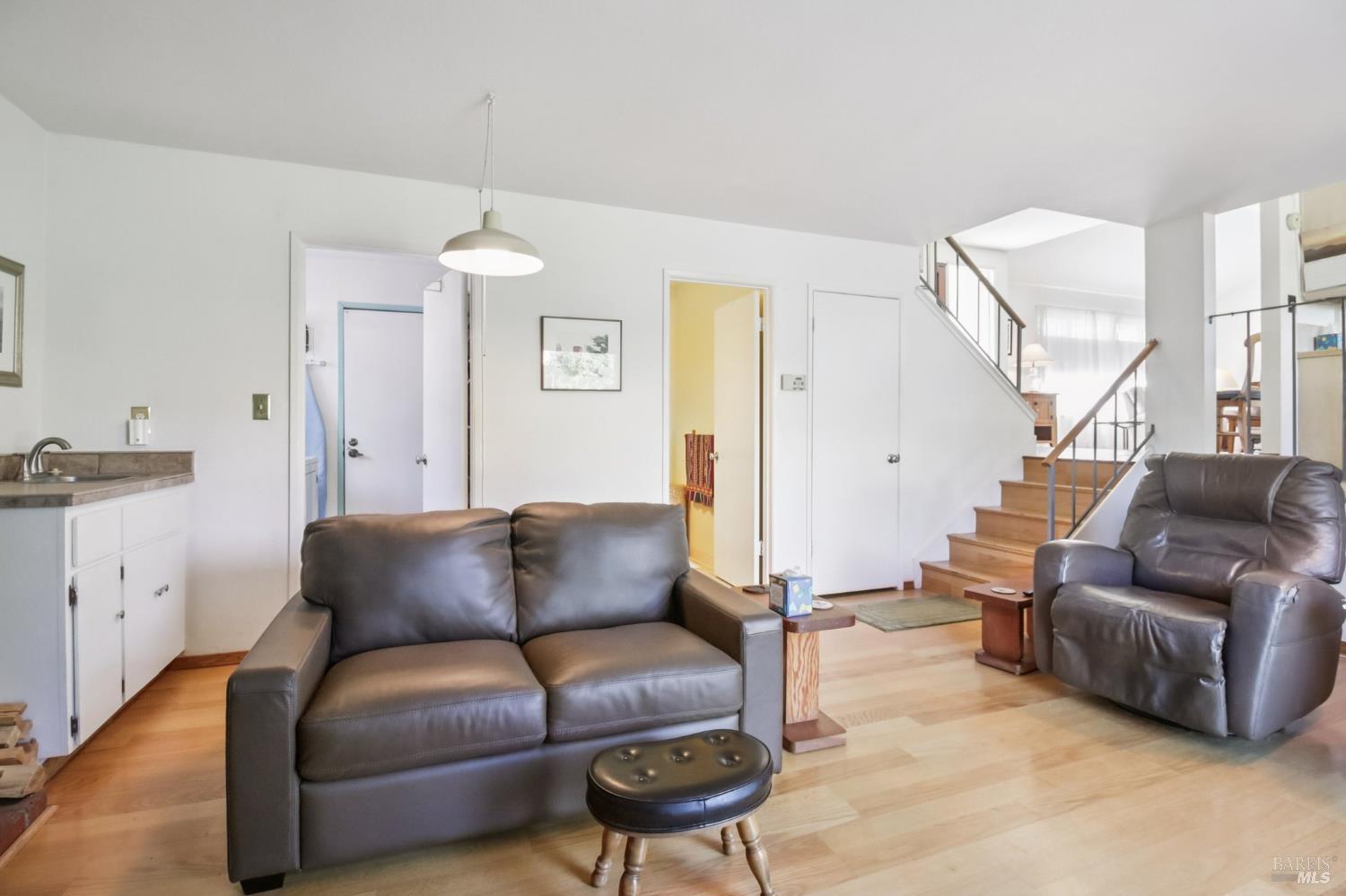 3217 Ensenada Drive San Ramon, CA 94583 - Photo 19 of 64 a living room with furniture and a chandelier