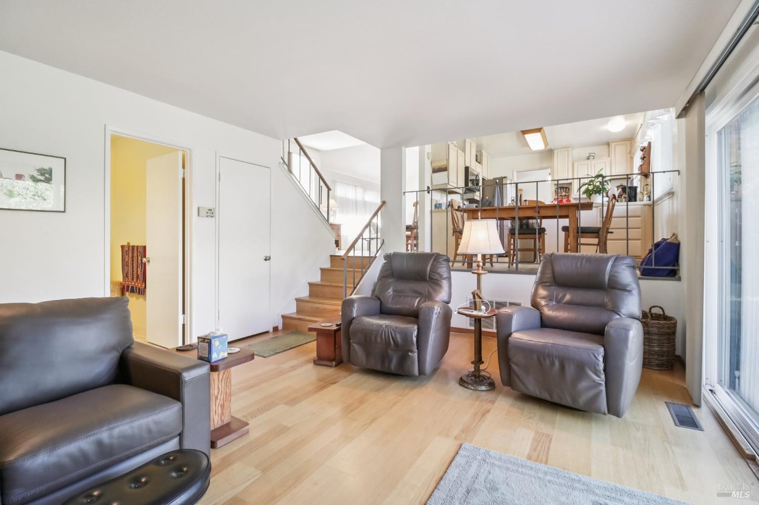3217 Ensenada Drive San Ramon, CA 94583 - Photo 20 of 64 a living room with furniture and a book shelf