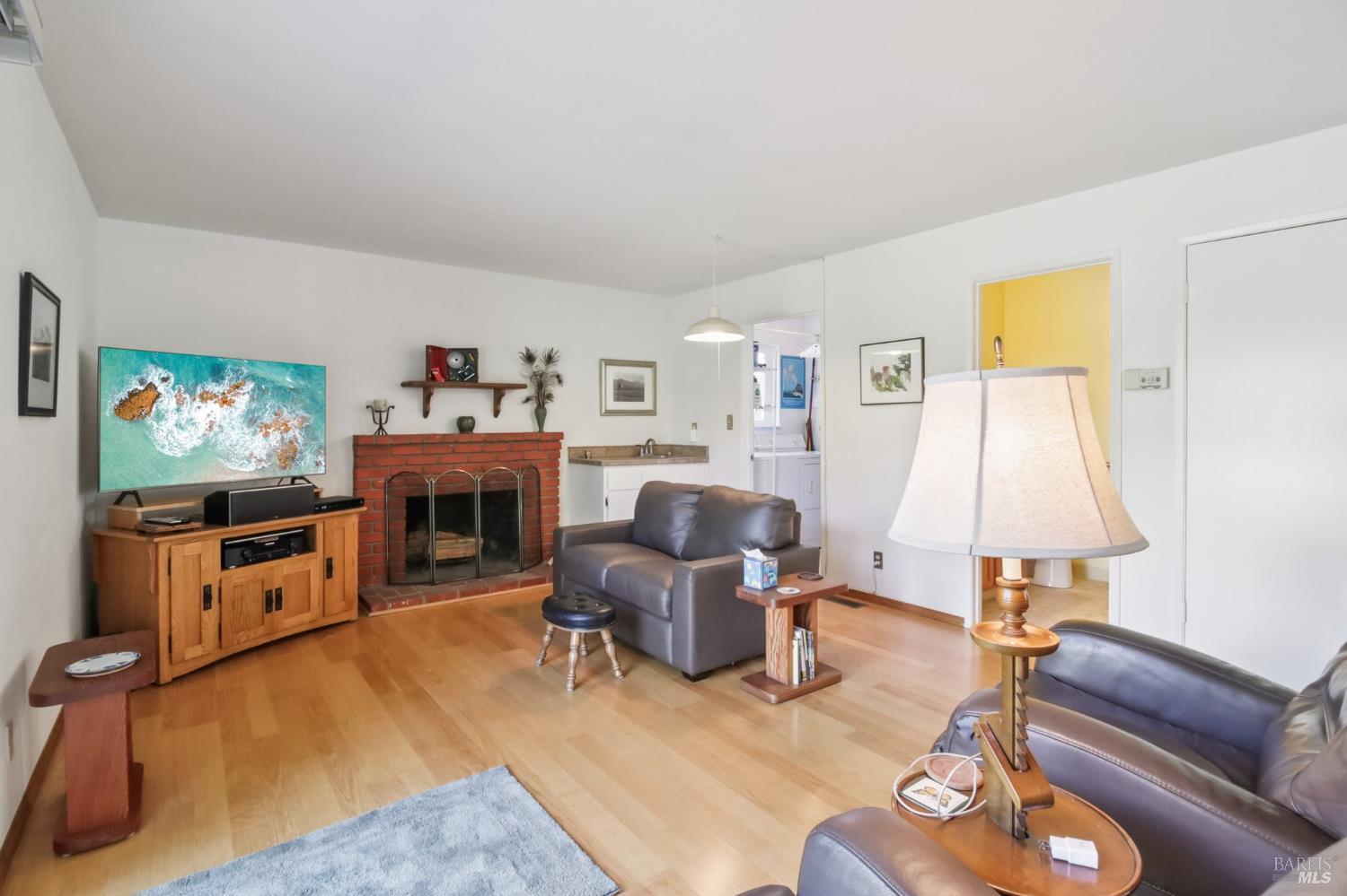 3217 Ensenada Drive San Ramon, CA 94583 - Photo 21 of 64 a living room with furniture and a flat screen tv