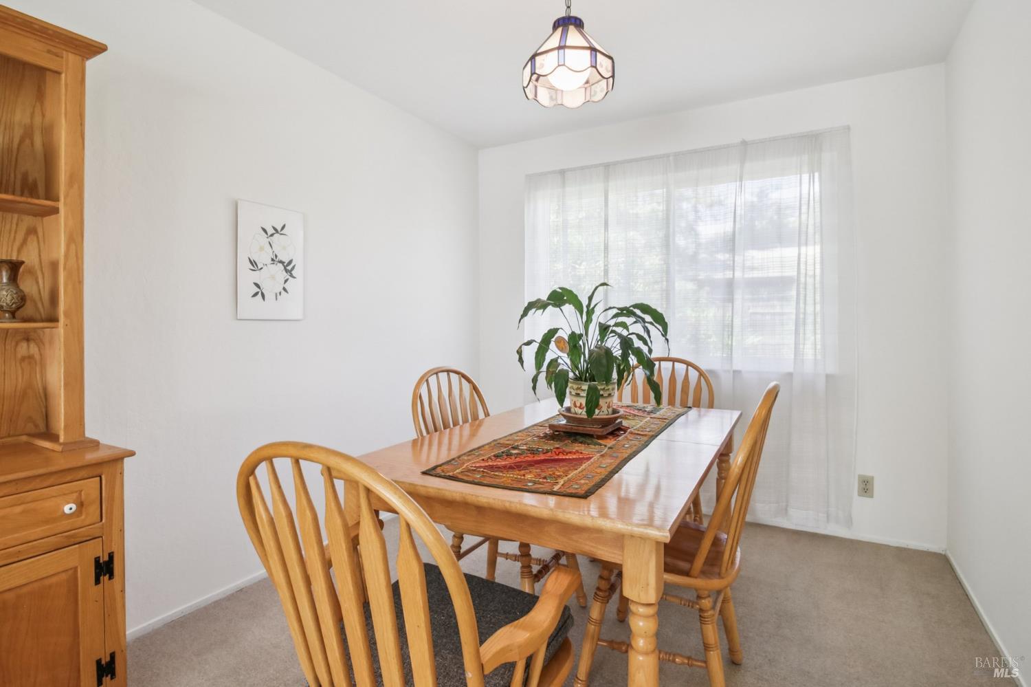 3217 Ensenada Drive San Ramon, CA 94583 - Photo 23 of 64 a view of a dining room with furniture window and wooden floor