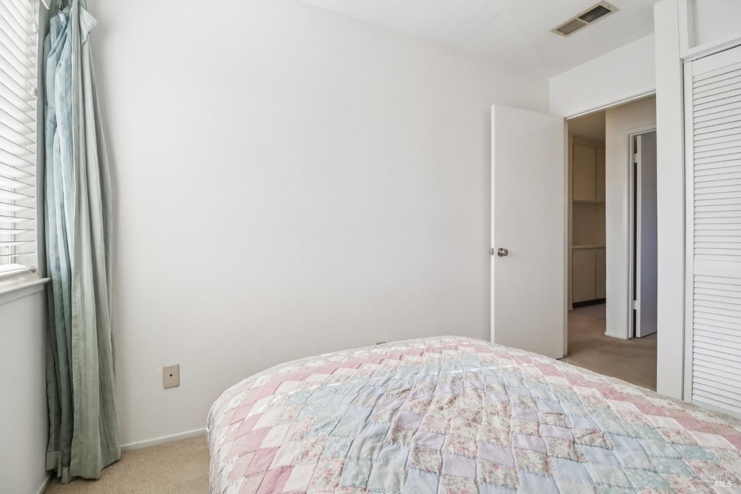 3217 Ensenada Drive San Ramon, CA 94583 - Photo 45 of 64 a bedroom with a bed and a mirror