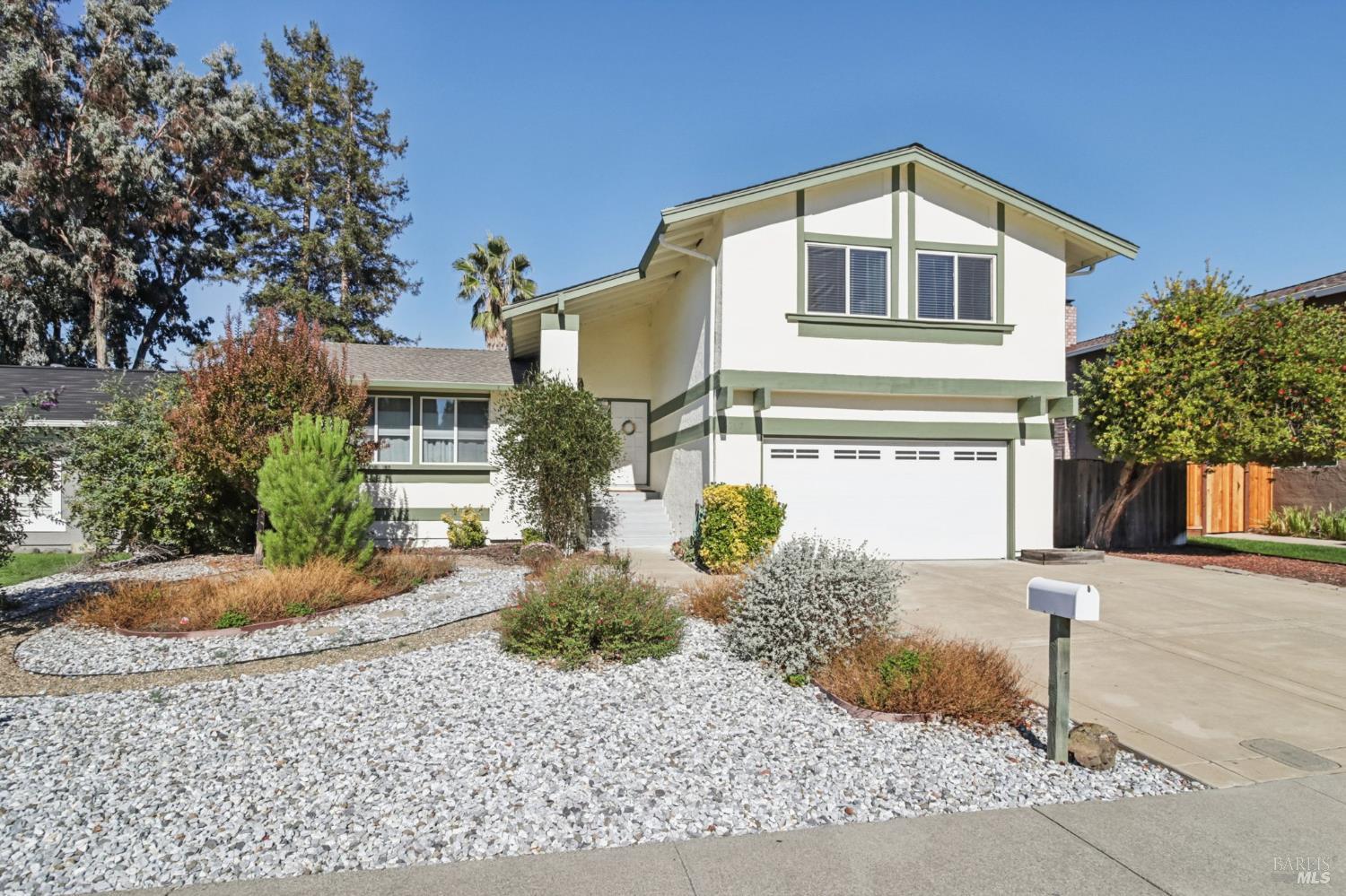 3217 Ensenada Drive San Ramon, CA 94583 - Photo 5 of 64 a front view of a house with a yard