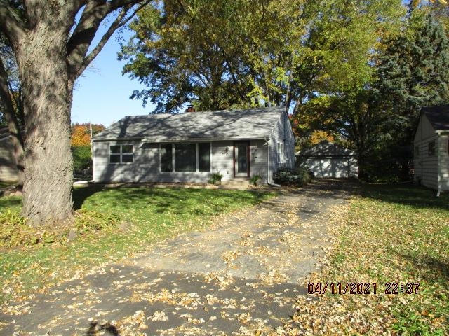 3918 Pinecrest Road Rockford, IL 61107 - Photo 1 of 21 a front view of a house with a yard