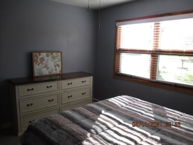 3918 Pinecrest Road Rockford, IL 61107 - Photo 15 of 21 a bedroom with a bed and a window