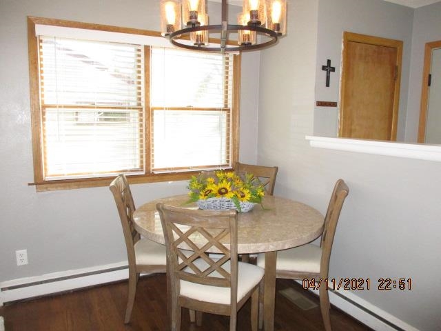 3918 Pinecrest Road Rockford, IL 61107 - Photo 4 of 21 a view of a dining room with furniture and chandelier