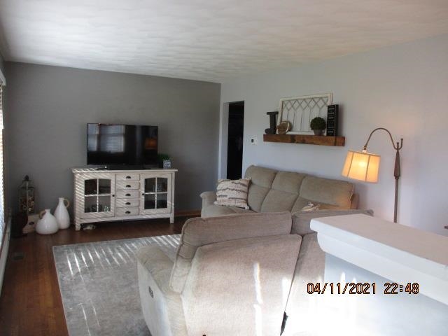 3918 Pinecrest Road Rockford, IL 61107 - Photo 5 of 21 a living room with furniture and a flat screen tv