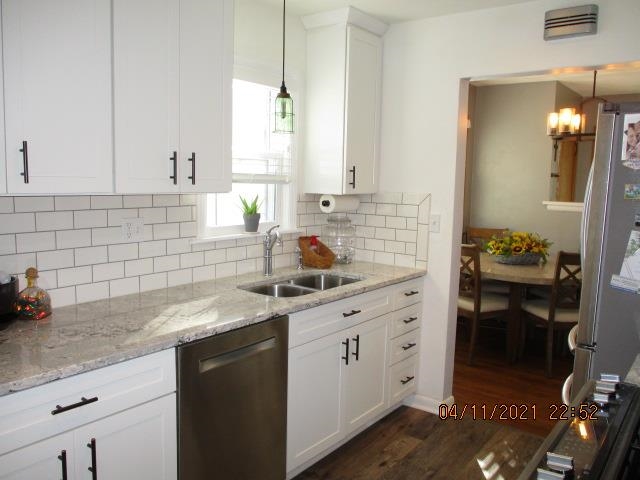 3918 Pinecrest Road Rockford, IL 61107 - Photo 8 of 21 a kitchen with a sink cabinets and window