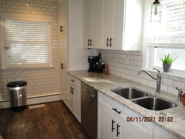 3918 Pinecrest Road Rockford, IL 61107 - Photo 10 of 21 a kitchen with a sink and a stove