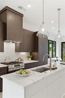 a kitchen with sink and stove