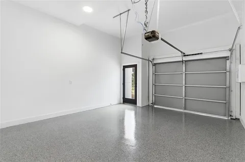 a view of an empty room with empty shelves