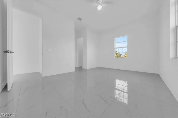 an empty room with windows