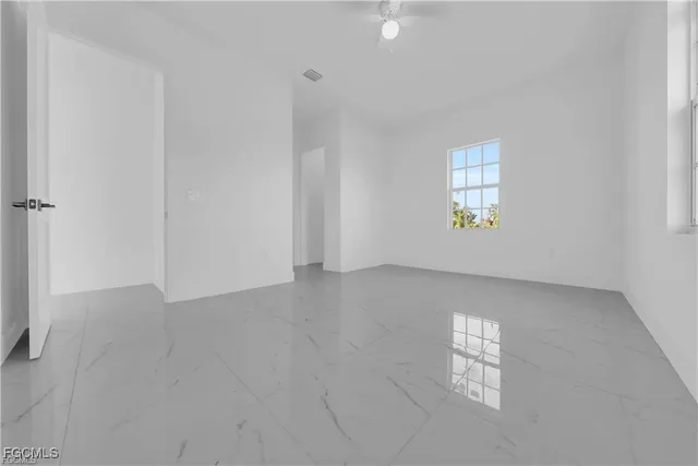 an empty room with windows
