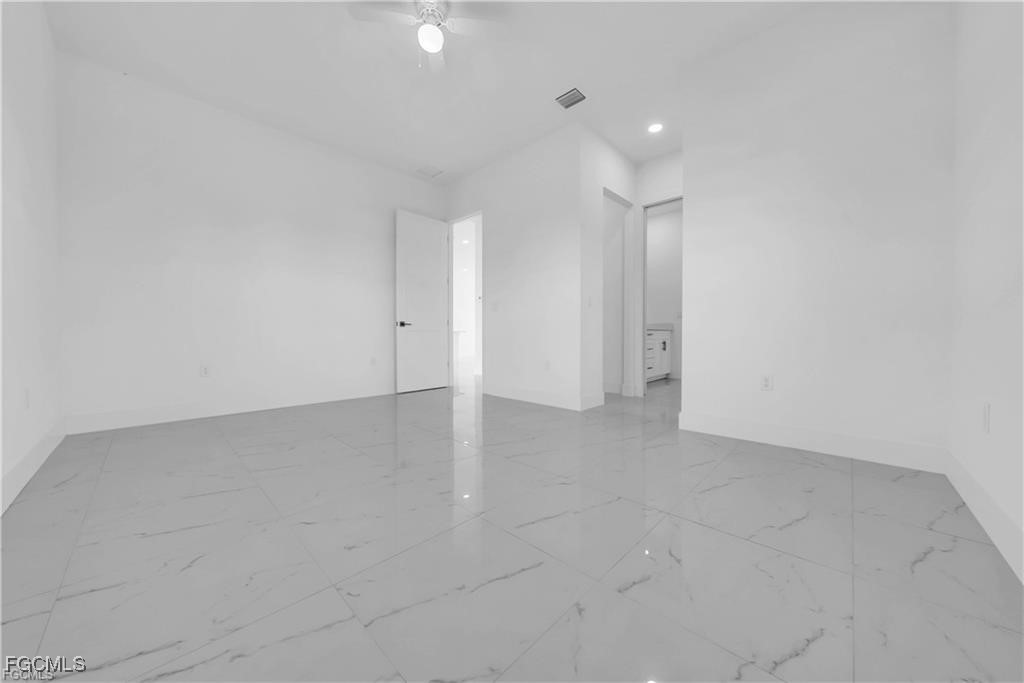 3310 11th Street West Lehigh Acres, FL 33971 - Photo 8 of 20 a view of an empty room