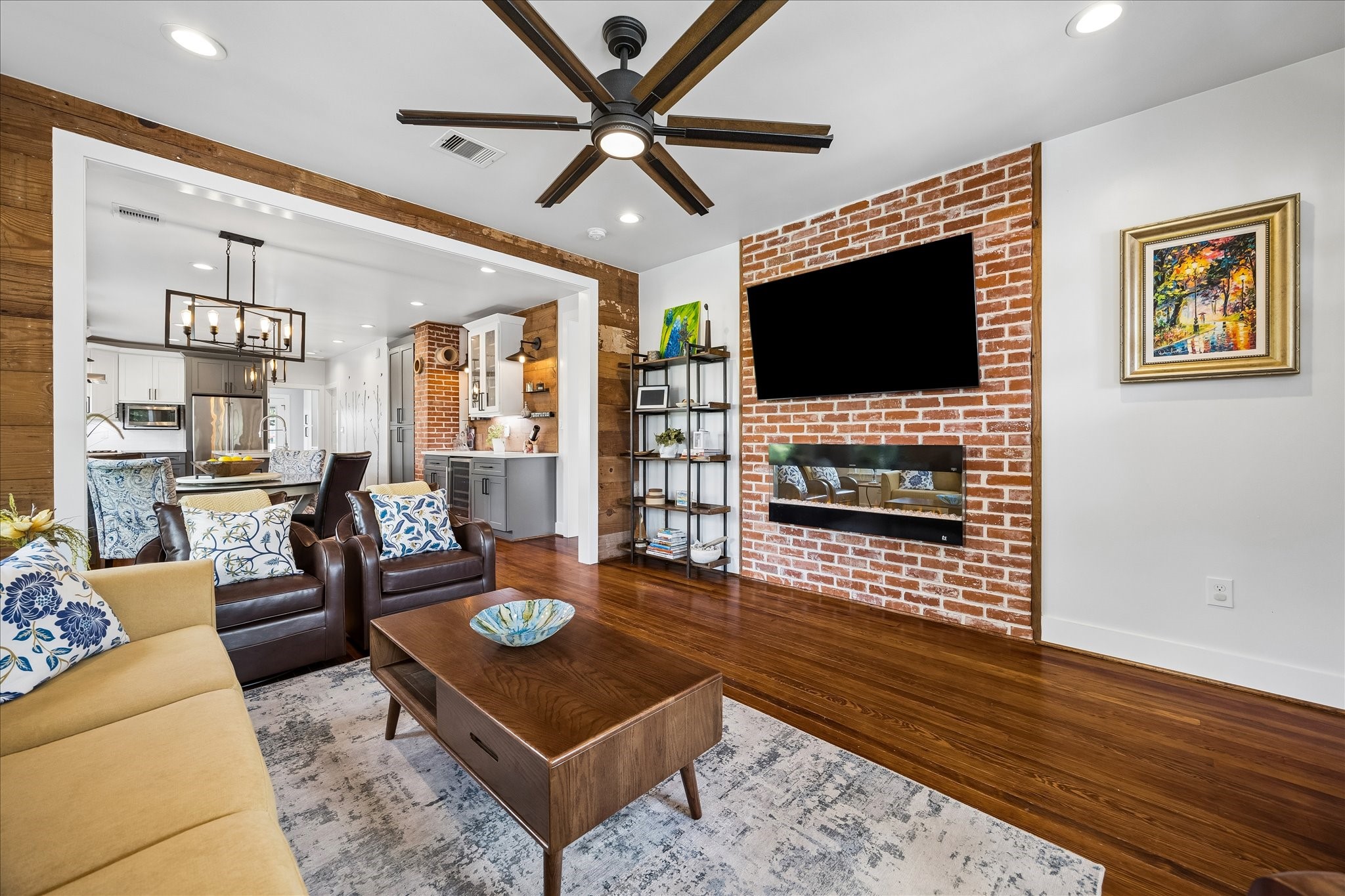 1019 East 14th Street Houston, TX 77009 - Photo 5 of 34 a living room with furniture and a flat screen tv