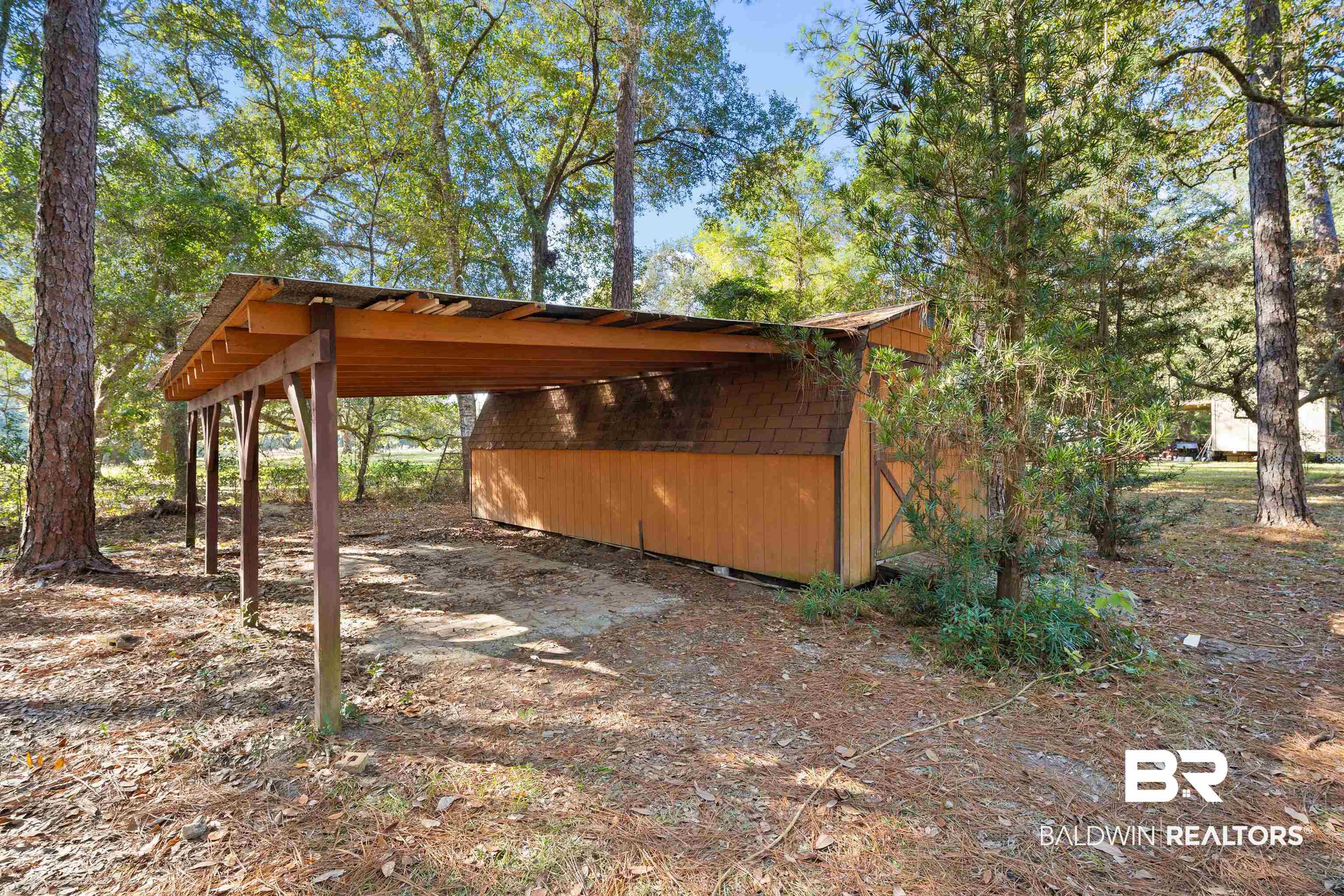 11236 Wren Avenue Fairhope, AL 36532 - Photo 27 of 35 View of home's exterior featuring a carport