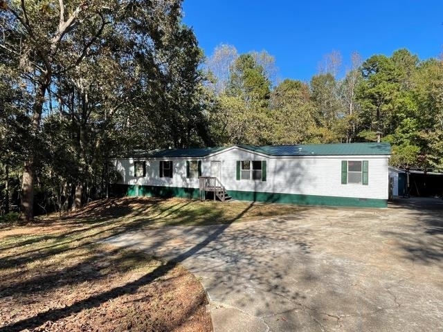 233 Amber Ridge Road Statham, GA 30666 - Photo 1 of 1 a view of a house with a yard