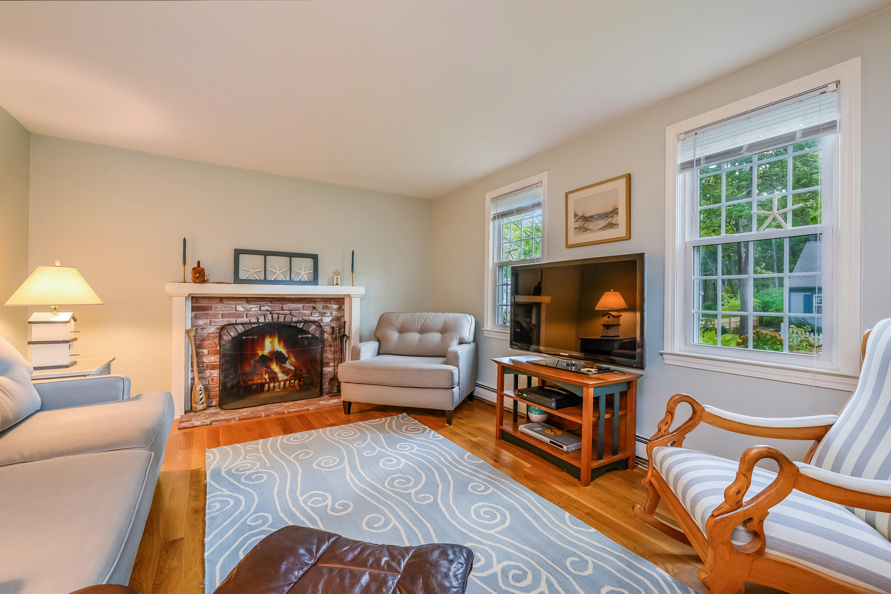 54 Chadwick Road South Dennis, MA 02660 - Photo 3 of 20 Living room fireplace