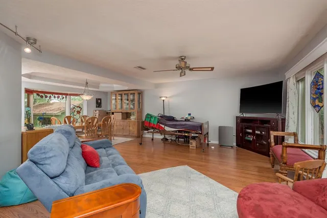 a view of a dining room with furniture window and outside view