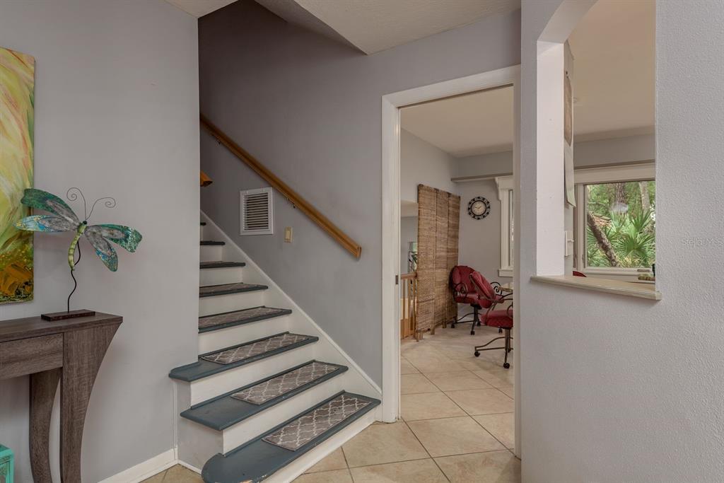 2279 Ranchette Lane Dunedin, FL 34698 - Photo 28 of 50 a view of entryway and workspace