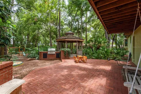 a view of a field with trees