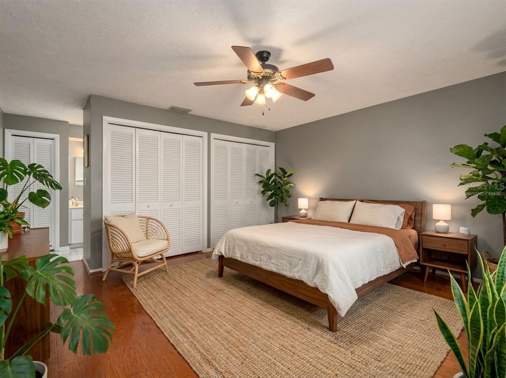 2279 Ranchette Lane Dunedin, FL 34698 - Photo 5 of 50 a bedroom with a bed and a window