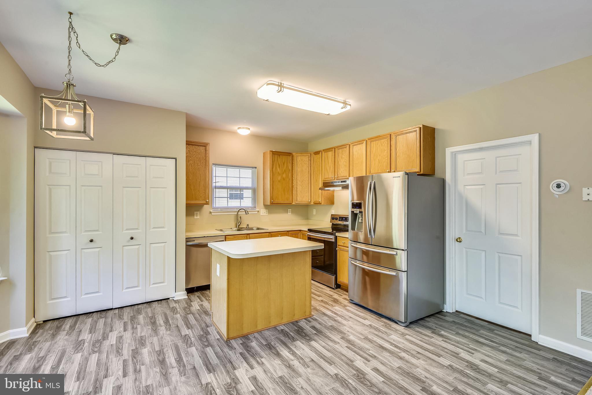 8174 WB&A Road Severn, MD 21144 - Photo 11 of 36 Full view of kitchen, table space to the left