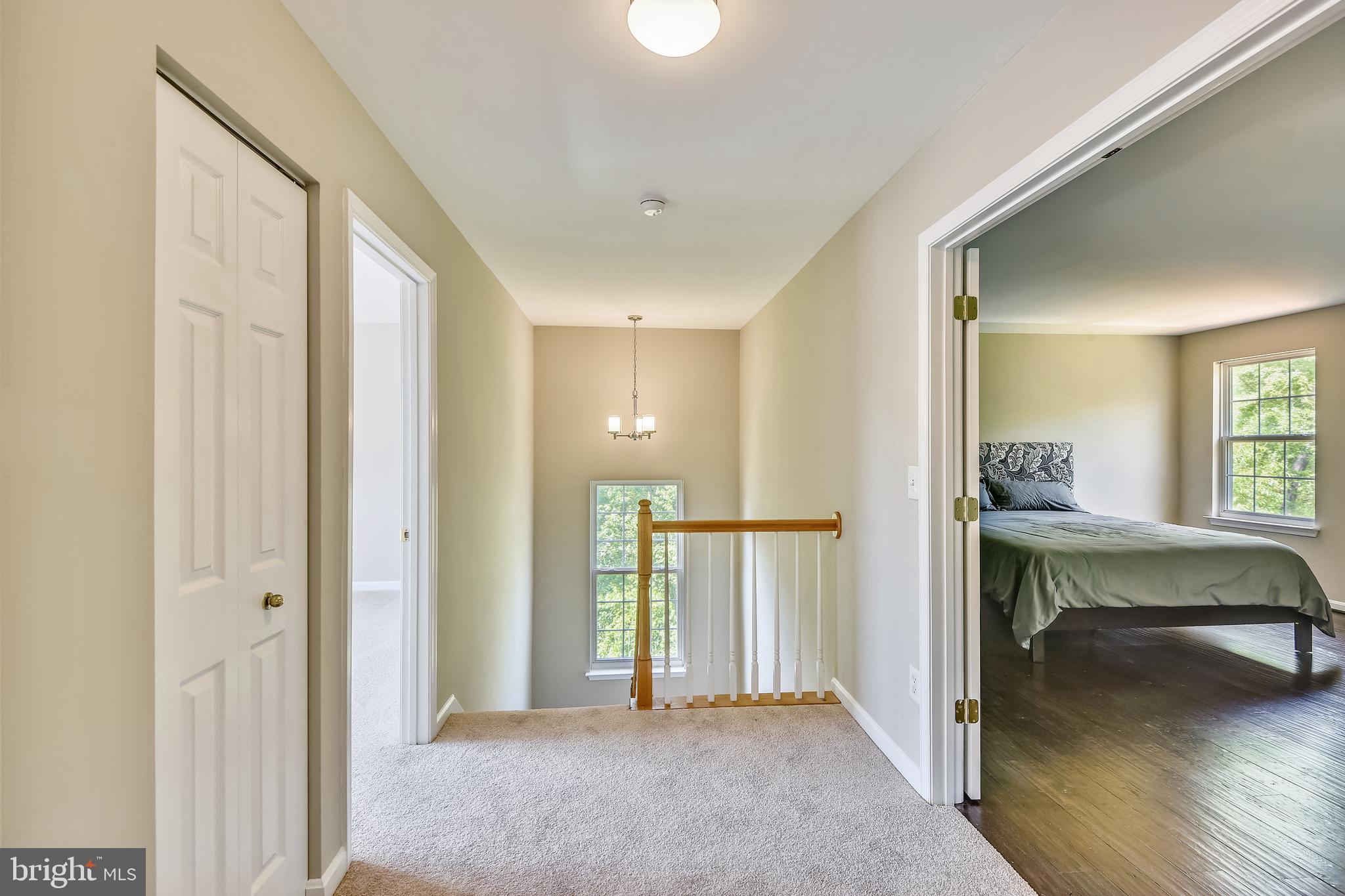 8174 WB&A Road Severn, MD 21144 - Photo 18 of 36 Upstairs hall, owner's suite to the right