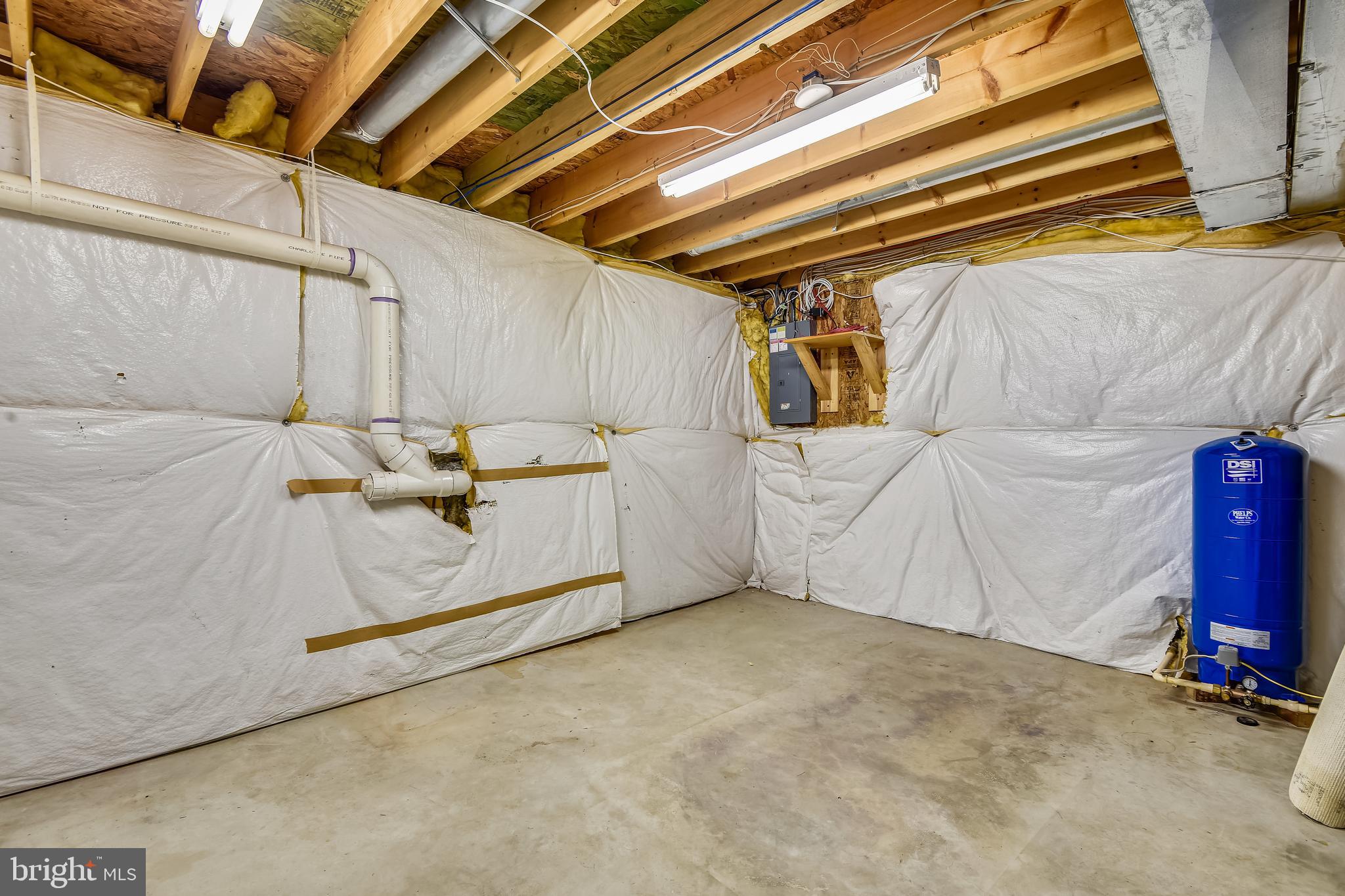 8174 WB&A Road Severn, MD 21144 - Photo 33 of 36 The larger storage room in the basement