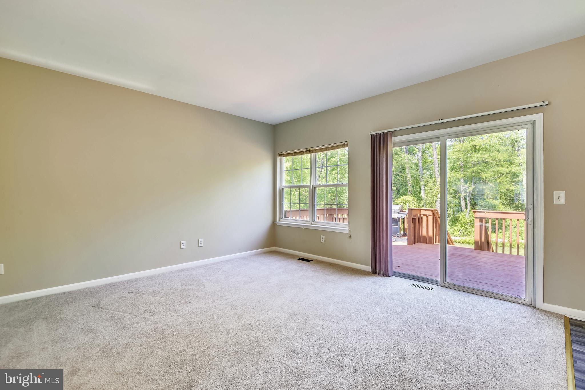 8174 WB&A Road Severn, MD 21144 - Photo 7 of 36 Kitchen great room leads to deck