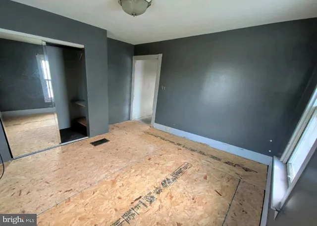 a bathroom with a tub sink and toilet
