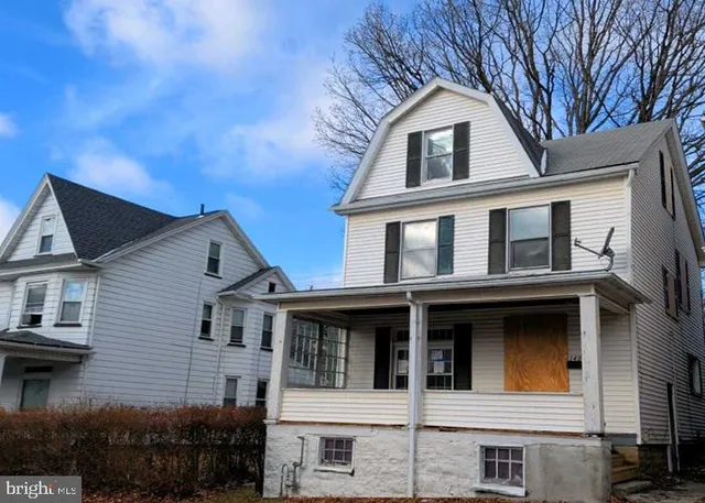 a front view of a house with windows