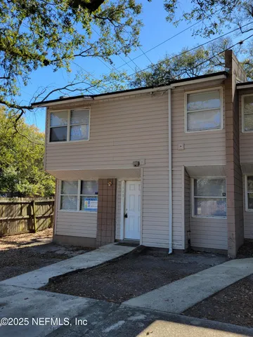 a front view of a house with a garage