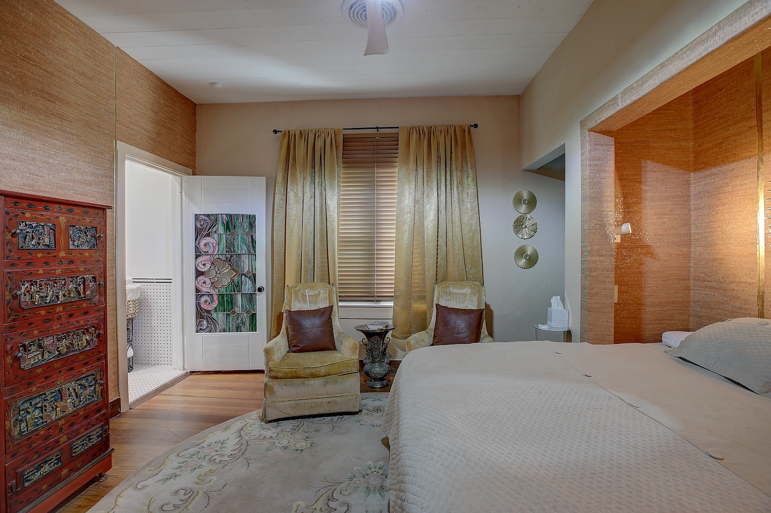 1903 South Austin Avenue Georgetown, TX 78626 - Photo 26 of 40 The serene room, has en suite bath, and designer cork wall paper. That absorb sound, and warm the space. indirect lighting says that this space is spectacular and serene. What a way to unwind at the end of the day