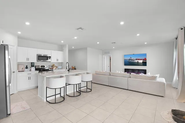 $395,500 | 113 Dabou Loop, Belle Glade, FL 33430