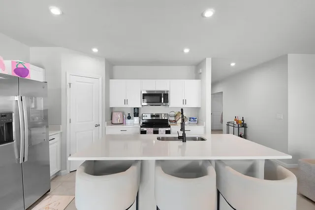 $395,500 | 113 Dabou Loop, Belle Glade, FL 33430