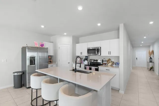 $395,500 | 113 Dabou Loop, Belle Glade, FL 33430