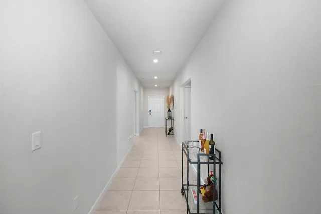 $395,500 | 113 Dabou Loop, Belle Glade, FL 33430