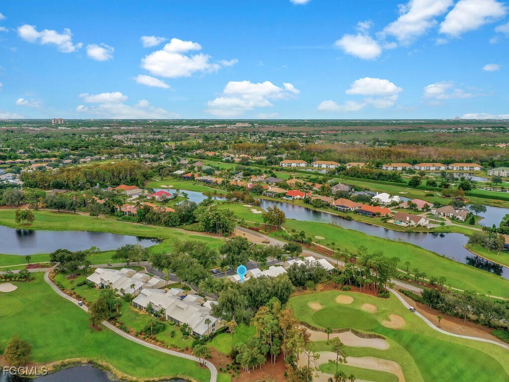 a view of a lake with a city