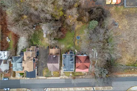 a view of backyard with green space