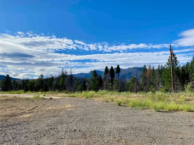 a view of a golf course with a lake