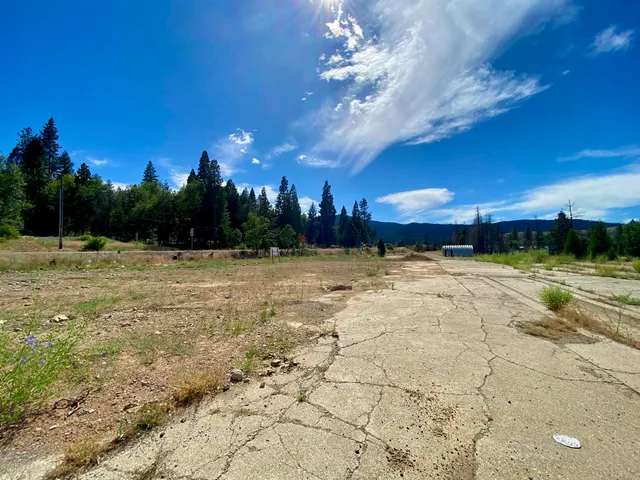 a view of a swimming pool with an outdoor seating