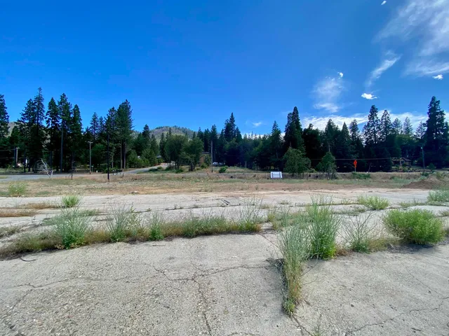 a view of outdoor space with swimming pool and outdoor seating
