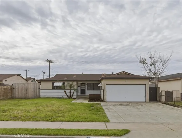 a view of a house with a back yard