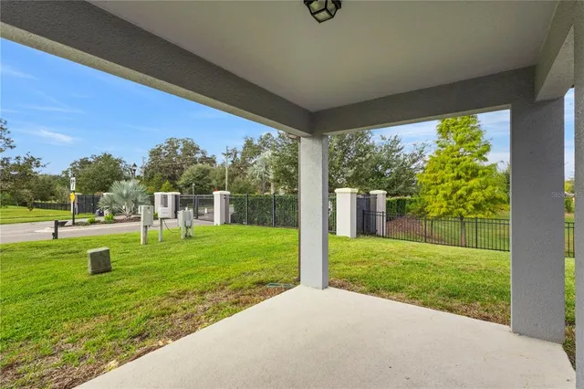 a view of a porch with a big yard