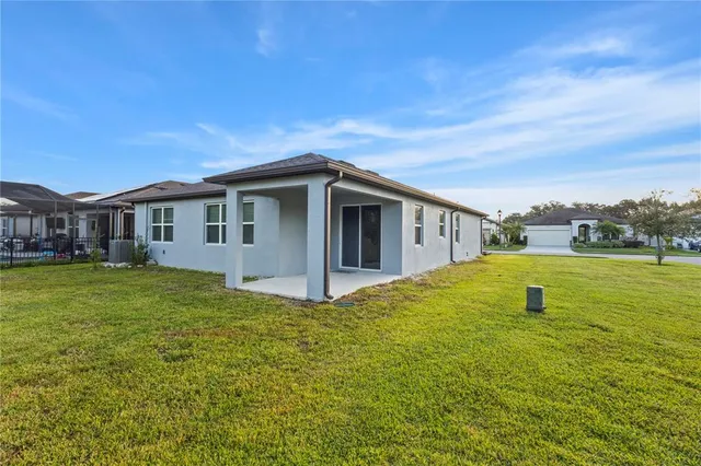 a view of a house with a swimming pool