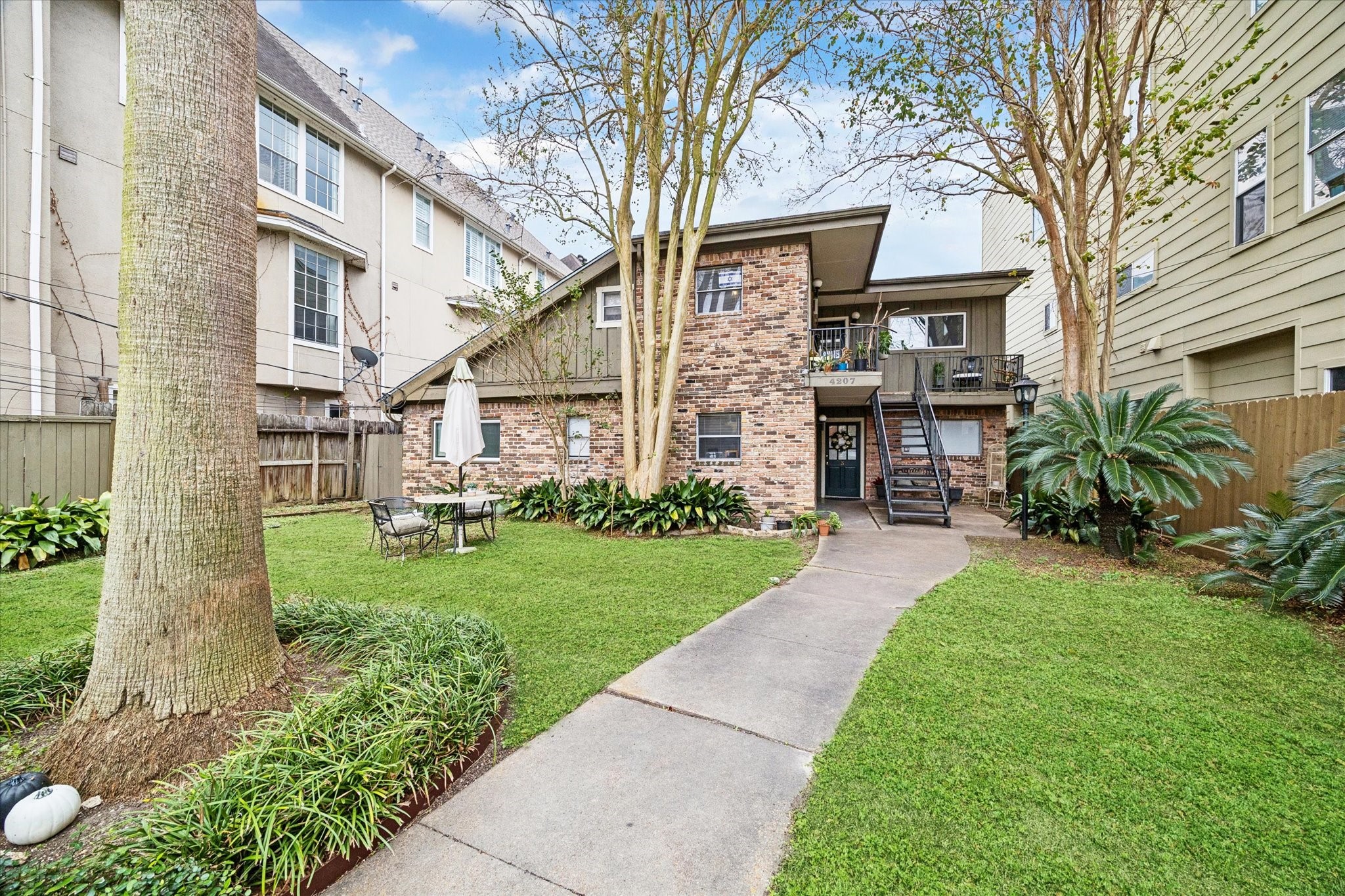 4207 Drake Street Houston, TX 77005 - Photo 1 of 24 a view of a yard in front view of a house