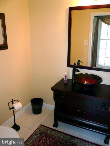 3108 Newcastle Lane Riva, MD 21140 - Photo 11 of 29 Custom designed vanity,tile floor-Main Level