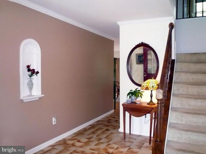 3108 Newcastle Lane Riva, MD 21140 - Photo 22 of 29 Foyer with ceramic tile and open staircase